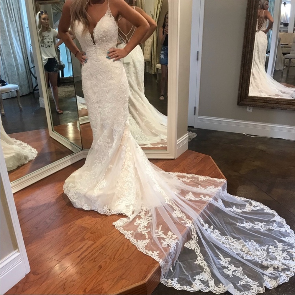 Stella York wedding dress size 4 but altered to my size 0.